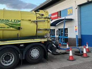 Another Jet and Drain Vacuum Tanker pumping waste outside business premises in London
