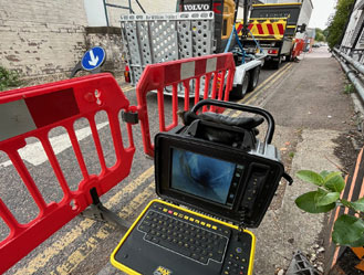 CCTV drainage camera set up on site to investigate a fully blocked drain in Epsom.