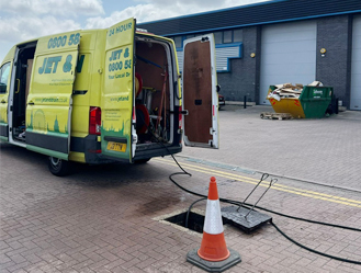 Jet & Drain engineers carrying out professional manhole chamber cleaning on-site.