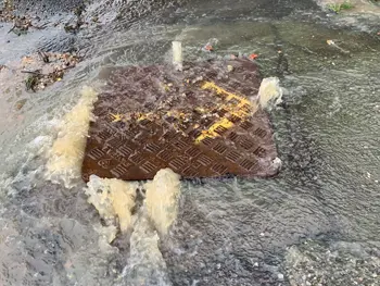Overflowing Manhole Drain Requires Immediate Unblocking.