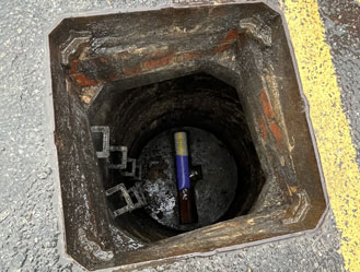 The new liner positioned inside the access chamber, ready for curing.