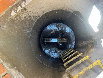 Manhole Opened and Jet and Drain engineers investigate why blocked.